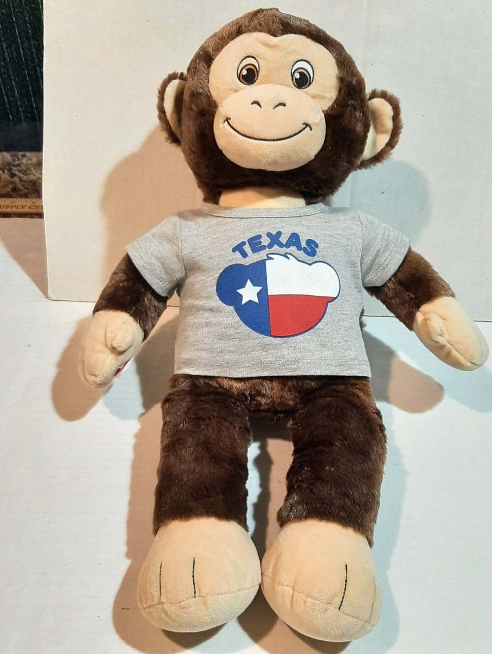Build-A-Bear Workshop Smiley Monkey Plush With Grey Texas Shirt On